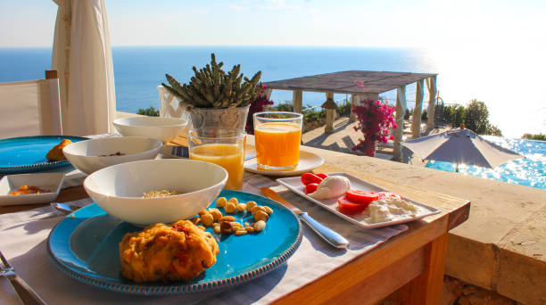 Breakfast with seaview in Puglia in Italy Breakfast with seaview in Puglia in Italy salento puglia stock pictures, royalty-free photos & images