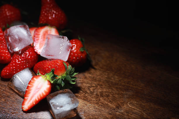 istock Fresh ripe strawberries on a wooden table 1163481708