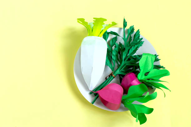 istock Radish, parsley and daikon made from paper 1163482378