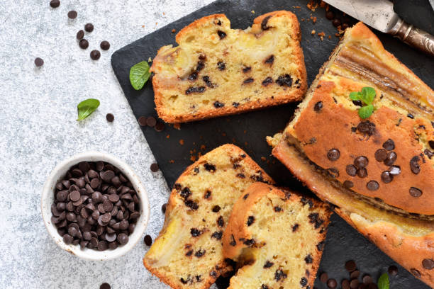 istock Banana cake with chocolate drops on the kitchen table. Classic dessert. 1163483566