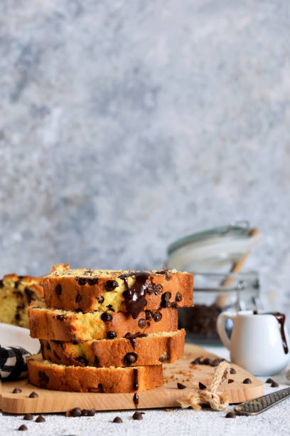 istock Vanilla bread with chocolate drops on the kitchen table. Slices of cake. 1163483928