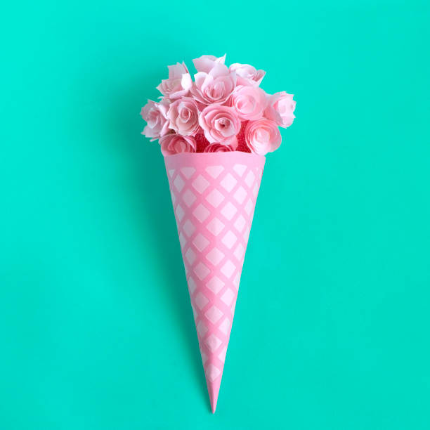 istock Paper waffle cone with flowers 1163487668