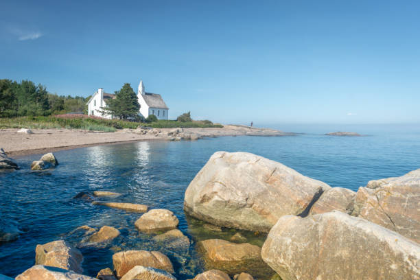 istock Chapel on the shore of the St.Lawrence River 1163488104