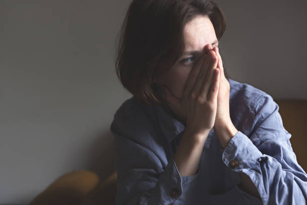 istock Lonely young woman depressed and stressed 1163489591