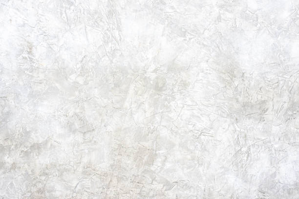 istock White stucco wall background, White painted cement wall texture background 1163489774