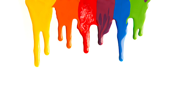 Colorful paint stains dripping from the top on white background, panorama, copy space