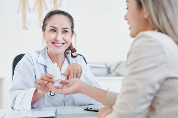 istock Physician giving treatment to patient 1163491517