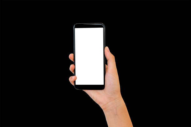 istock Hand holding the modern smartphone with blank screen and modern design - isolated on black background 1163493276