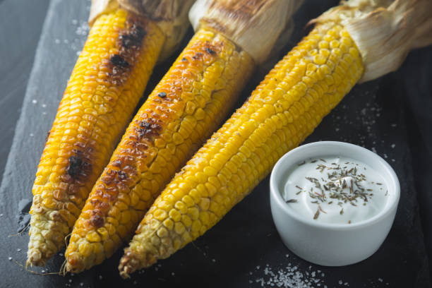 istock Baked corn with spices and yoghurt sauce 1163494302