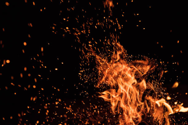 istock Burning sparks flying. Beautiful flames background. 1163495629