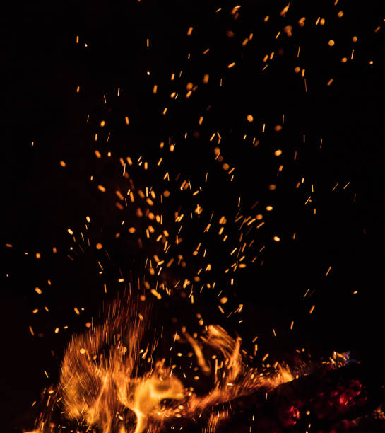 istock Burning sparks flying. Beautiful flames background. 1163495709