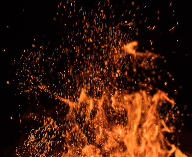 istock Burning sparks flying. Beautiful flames background. 1163495748