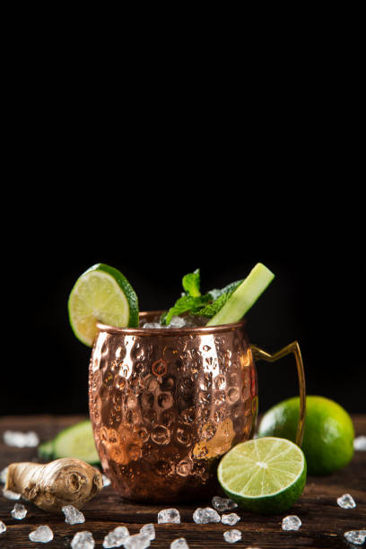 istock Famous Moscow mule alcoholic cocktail in copper mugs. 1163496078