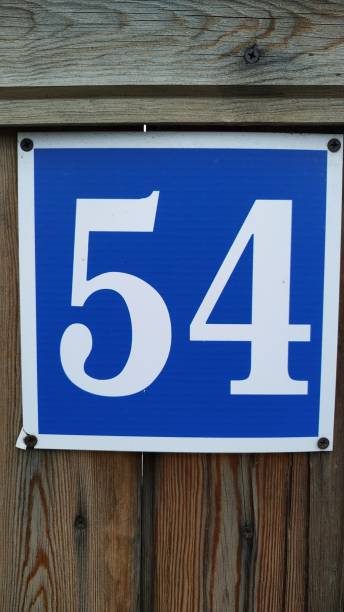 istock The number 54 is white in blue frame. Close-up. 1163497148