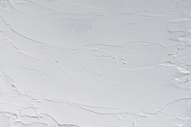 istock white and gray oil abstract background painting 1163497309
