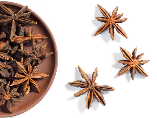 istock Anise (Anisum vulgare) on a brown clay plate on a white background 1163497941