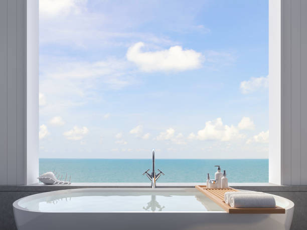 close up of bathtub with sea view background 3d render - tropical spa imagens e fotografias de stock