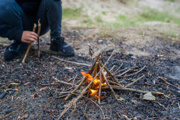 istock Burning fire on a summer day. Travel, hike, halt concept. 1163498995