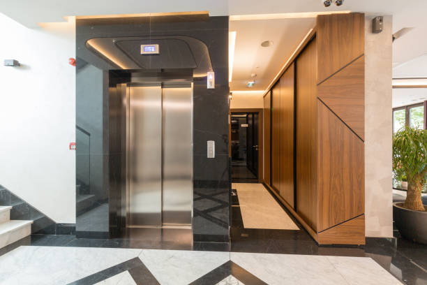 istock Interior of a shiny marble hotel corridor with elevator 1163499194