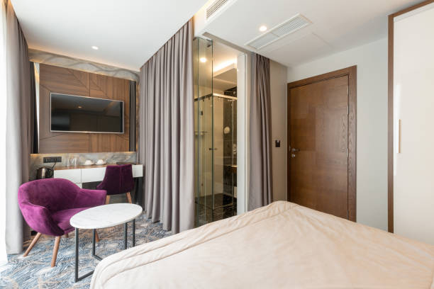istock Interior of a luxury hotel double bed bedroom 1163499253