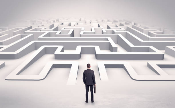istock Businessman starting a flat 3d labyrinth 1163499273