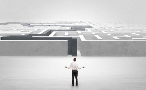 istock Businessman starting a stated labyrinth 1163499288