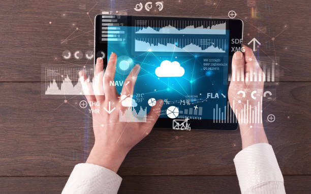 istock Hand holding tablet and checking finantial report concept 1163499629