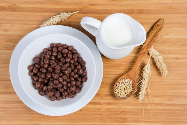 istock Top view of breakfast cereal chocolate balls and milk 1163499680