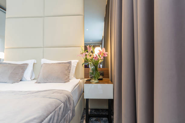 istock Interior of a luxury hotel double bed bedroom 1163500665