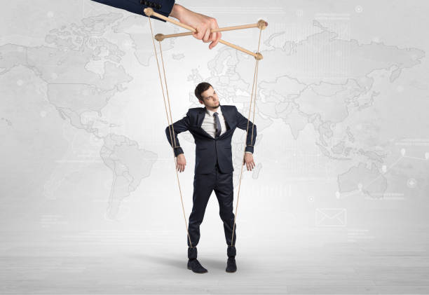 istock Puppet man with big city concept 1163500668