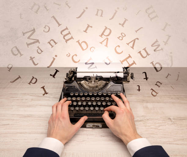 istock First person perspective elegant hand typing with flying letters concept 1163501777