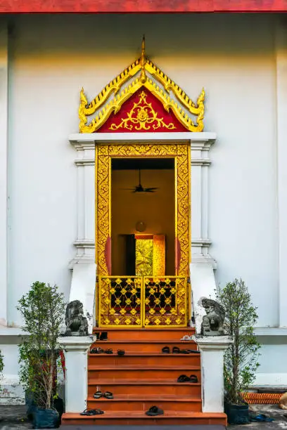 Photo of The iconic architecture view of Wat Phra Singh Woramahaviharn, a popular long history old Buddhist temple, in Chiang Mai, Thailand