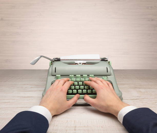 istock First person perspectve hand writing on an oldschool typewriter 1163501891