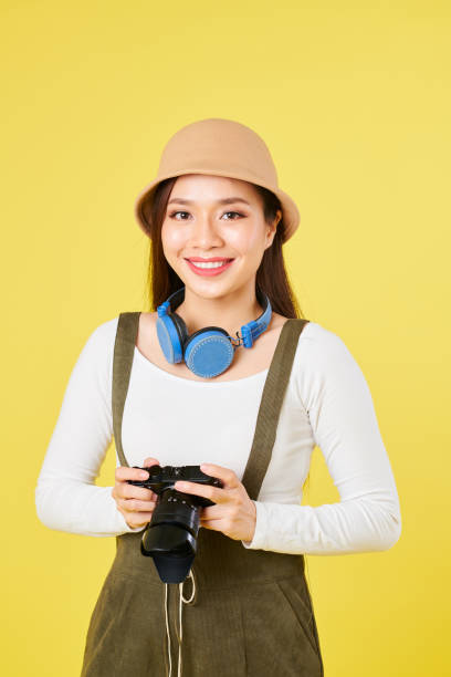 istock Smiling Asian female tourist 1163503246