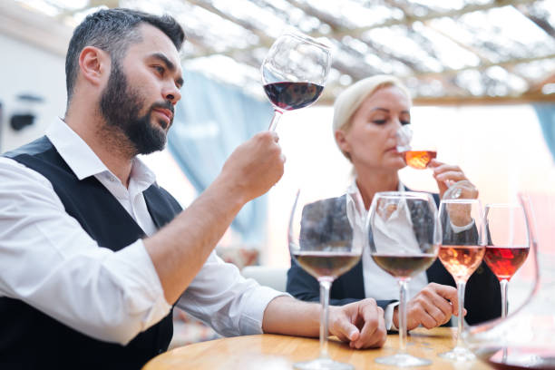 istock Young confident winery expert tasting new sort of red wine 1163504020