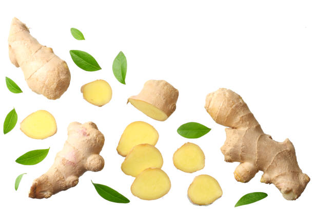 istock sliced ginger with leaves isolated on white background top view 1163506101