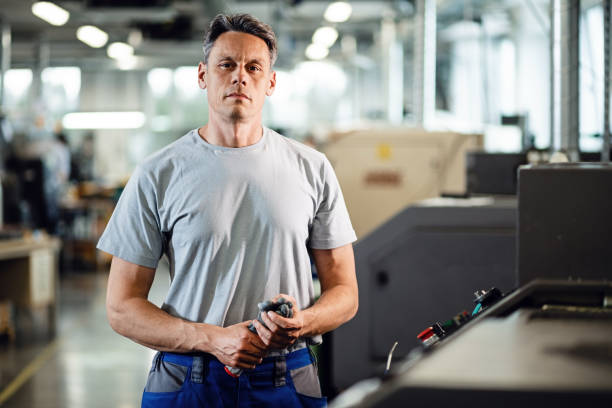 istock He is an expert in working on industrial machines! 1163518989