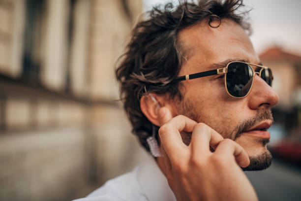 istock Detective receiving information on headphone 1163520451