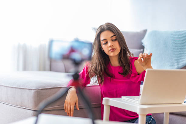 istock Beautiful woman blogger 1163520878