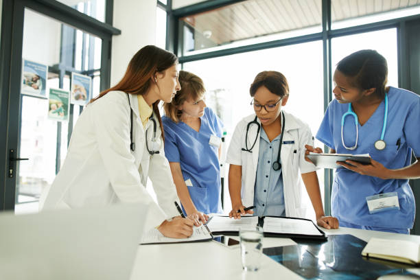 istock Keeping all their patient records updated 1163520985