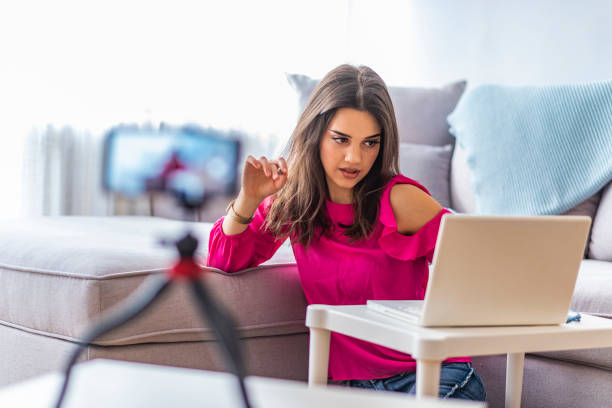 istock Beautiful woman blogger 1163521018