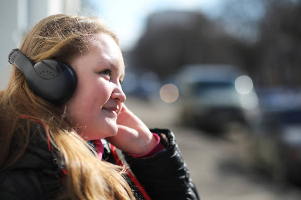 istock Girl on a walk in sunny weather 1163522529