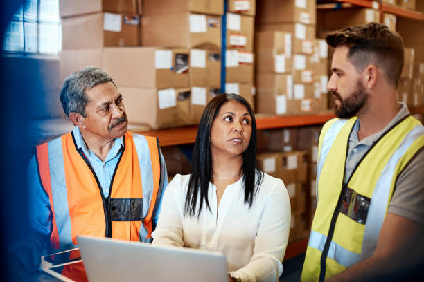 istock Discussing logistics on the warehouse floor 1163527853