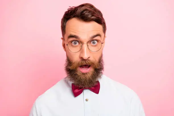 Photo of Close up photo of non-standard creative old-fashioned guy with comic appearance expressing amazement isolated pastel background