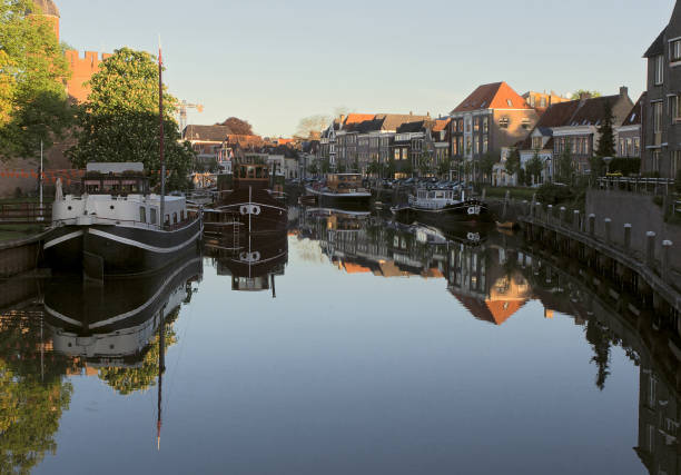 istock Morning over the canal with ships in Zwolle 1163530199