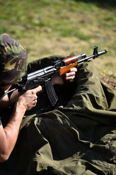 istock Outdoor target shooting with assault rifle in a shooting range 1163533218