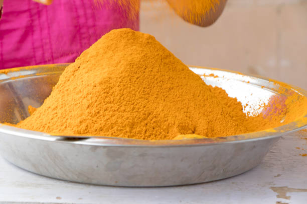 istock Turmeric powder getting refined at home by manual process 1163535807