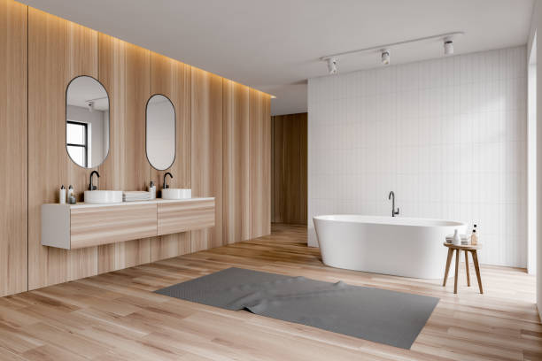 istock White and wood bathroom corner, double sink, tub 1163536481
