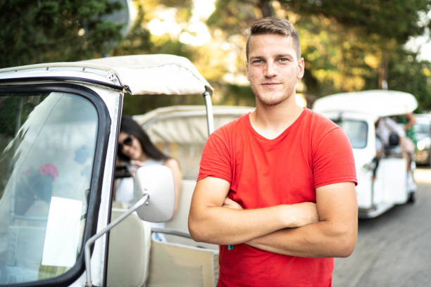 istock Portrait of young jinrikisha's (tuk tuk) driver 1163536698