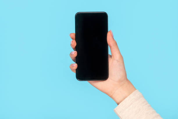 istock Crop girl showing modern phone 1163537643